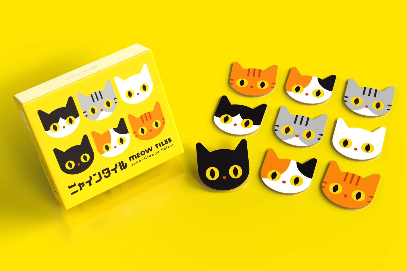 ニャインタイルのメーカー商品写真。猫型のタイルと独立した商品パッケージを示しています。